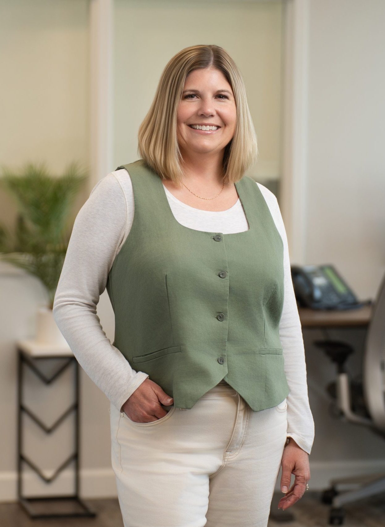 SD Capital member smiling in office